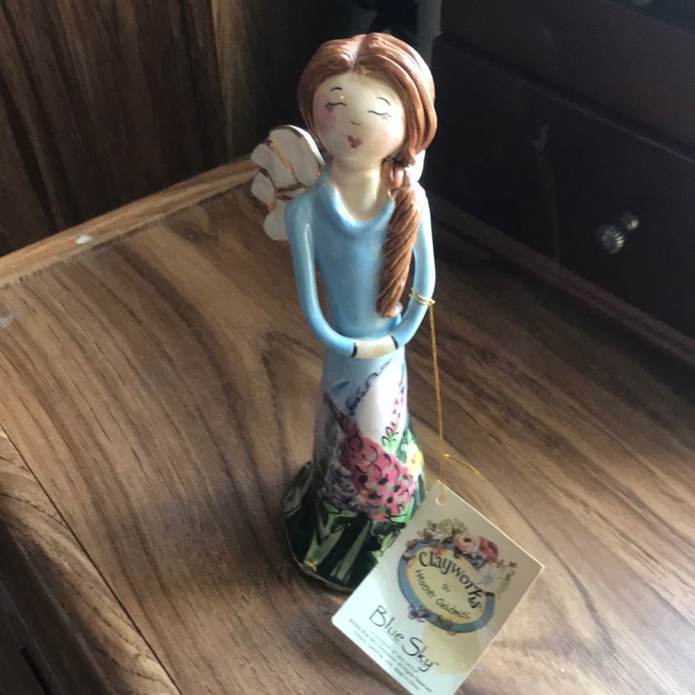 Clay works Angel Figurine by Heather Goldminc.